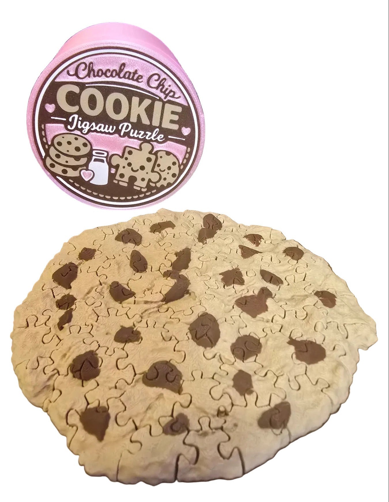 Cookie-shaped puzzle with a circular container labeled 'Chocolate Chip Cookie Puzzle' on a wooden surface.
